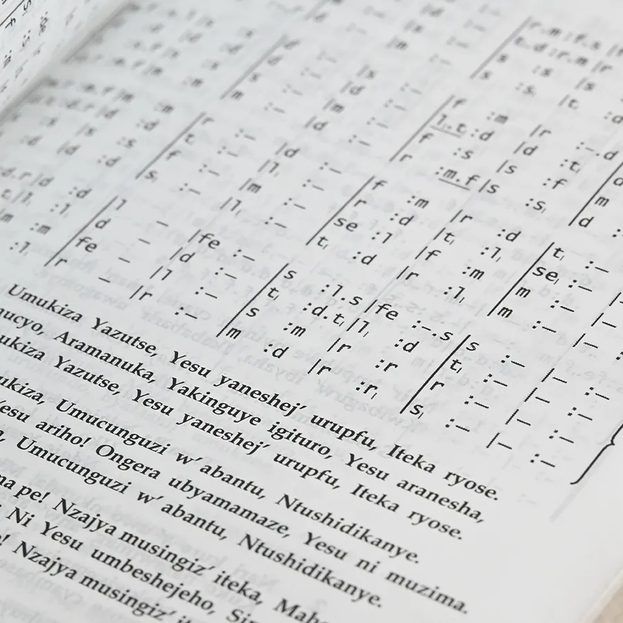 Hymnal open to music notation pages