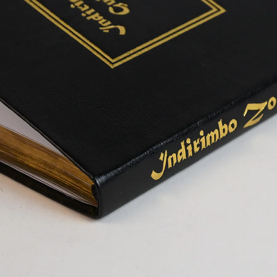 Black PU leather notebook with gold foil branding and gilded edges