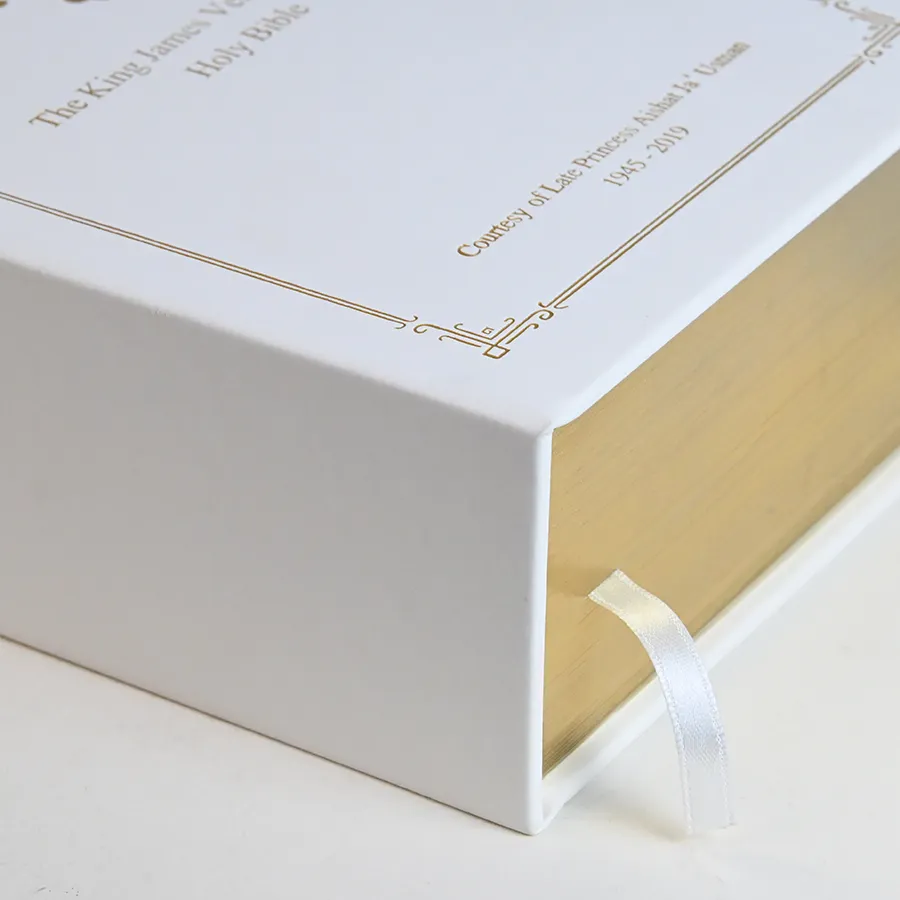 Presentation gift box with gold foil frame, gilded edges and ribbon